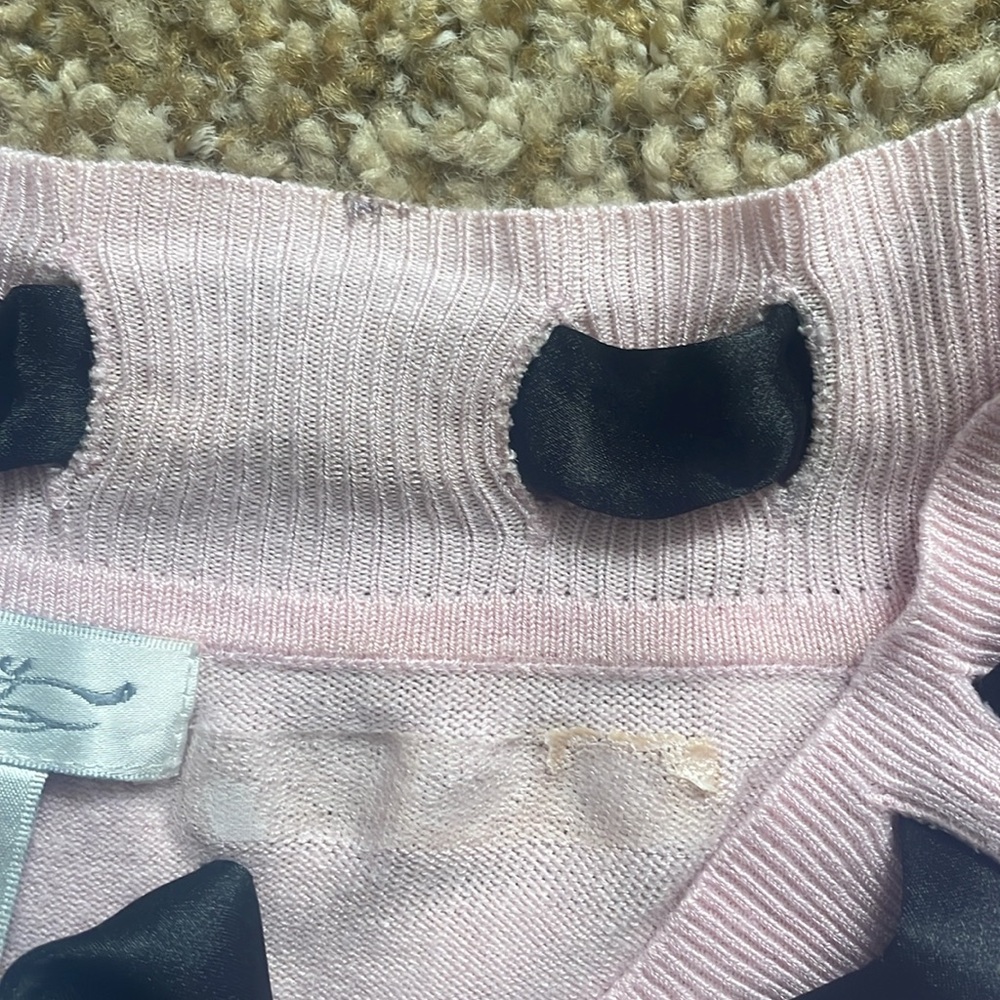 Pink sweater with black tie along neckline - Picture 4 of 11